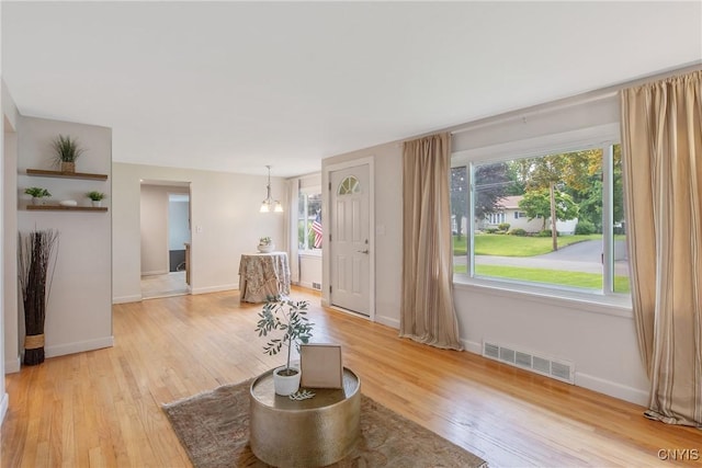 211 Fletcher Dr, Clay, NY 13212 - living room with light wood-type flooring and baseboards