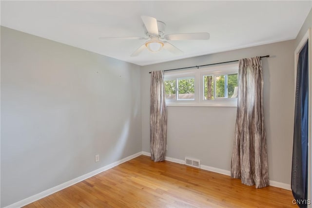 211 Fletcher Dr, Clay, NY 13212 - spare room with a ceiling fan, light wood-type flooring, and baseboards