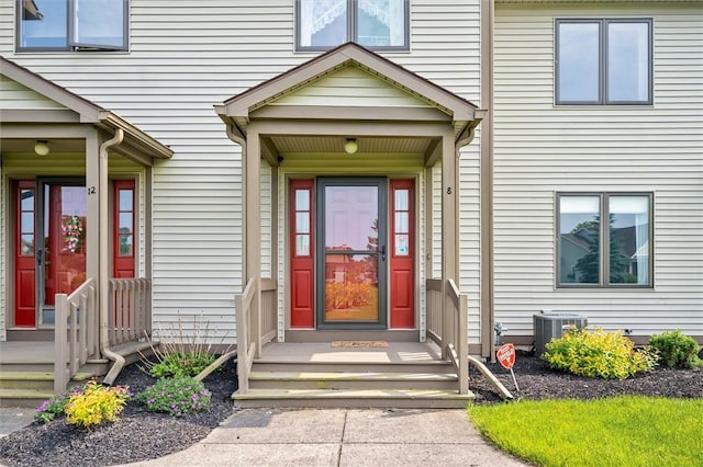 8 Harrier Cir, Henrietta, NY 14623 - view of exterior entry featuring central air condition unit