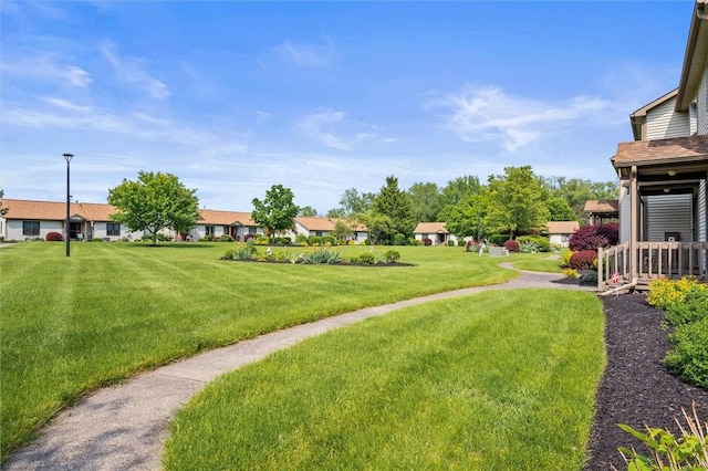 8 Harrier Cir, Henrietta, NY 14623 - view of grassy yard featuring a residential view