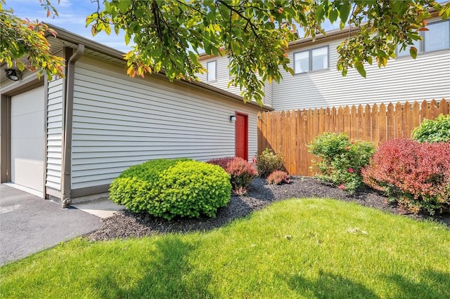 8 Harrier Cir, Henrietta, NY 14623 - view of home's exterior with a garage