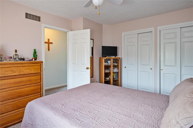 8 Harrier Cir, Henrietta, NY 14623 - bedroom with carpet, multiple closets, baseboards, and a ceiling fan