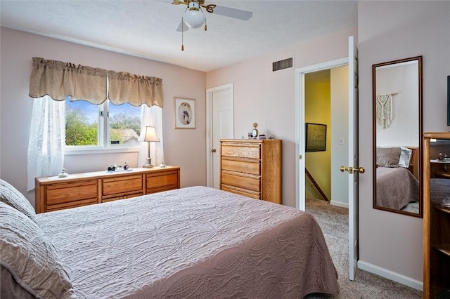 8 Harrier Cir, Henrietta, NY 14623 - bedroom featuring carpet, baseboards, and a ceiling fan