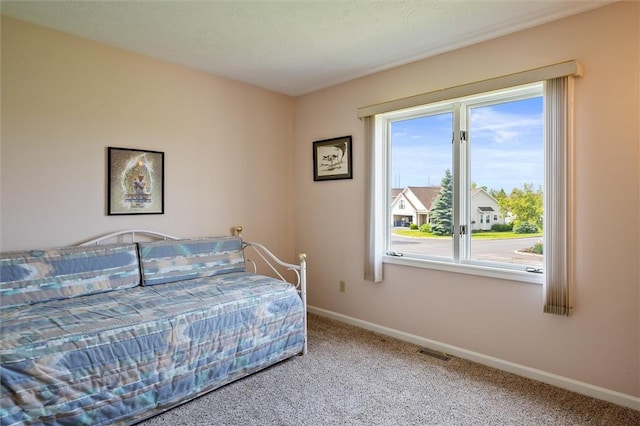8 Harrier Cir, Henrietta, NY 14623 - carpeted bedroom featuring baseboards