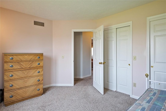 8 Harrier Cir, Henrietta, NY 14623 - bedroom with light colored carpet, baseboards, and a closet