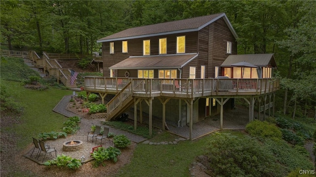 1388 Sky High Rd, Fabius, NY 13159 - rear view of house featuring stairs, an outdoor fire pit, a deck, and a yard