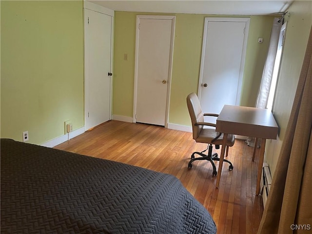 808 Fay, Bangor, NY 12966 - home office with hardwood / wood-style flooring and baseboards
