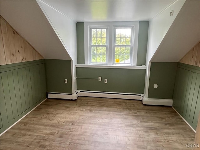 808 Fay, Bangor, NY 12966 - bonus room featuring wood finished floors and wooden walls