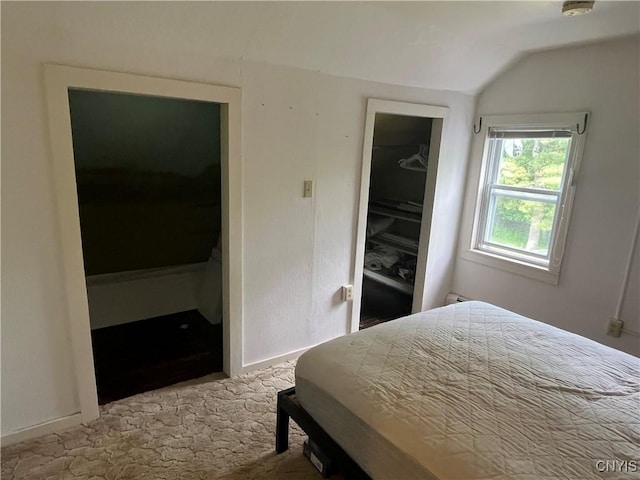 808 Fay, Bangor, NY 12966 - bedroom featuring lofted ceiling, carpet floors, and baseboards