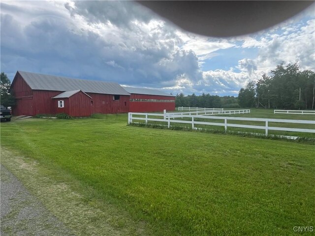 808 Fay, Bangor, NY 12966 - view of yard featuring an outbuilding