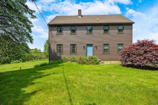 7739 Number 5 W Rd, Pompey, NY 13063 - back of property featuring a chimney and a yard