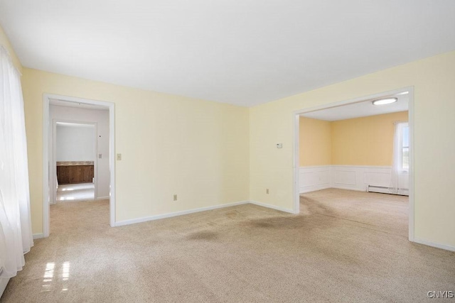 7739 Number 5 W Rd, Pompey, NY 13063 - spare room with baseboard heating and carpet