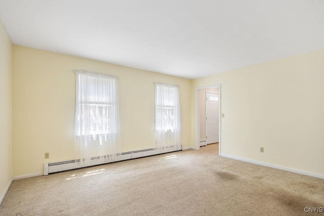 7739 Number 5 W Rd, Pompey, NY 13063 - carpeted spare room with a baseboard heating unit and baseboards