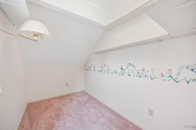 7739 Number 5 W Rd, Pompey, NY 13063 - additional living space featuring light carpet, vaulted ceiling, and baseboards