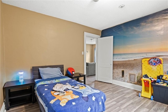 417 18th St, Niagara Falls, NY 14303 - bedroom with wood finished floors and baseboards