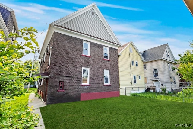 417 18th St, Niagara Falls, NY 14303 - view of home's exterior featuring brick siding