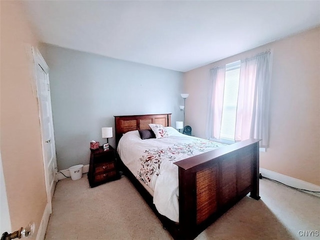 7 Genesee Ct, Utica, NY 13502 - bedroom featuring light colored carpet and baseboards