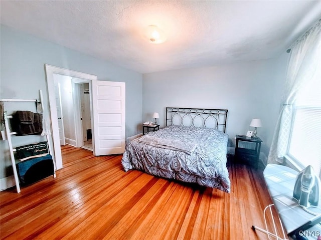 7 Genesee Ct, Utica, NY 13502 - bedroom with light wood-style floors