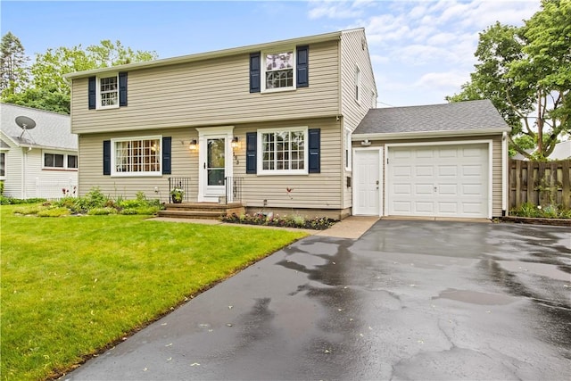 193 Floral Dr, Irondequoit, NY 14617 - colonial inspired home with asphalt driveway and an attached garage