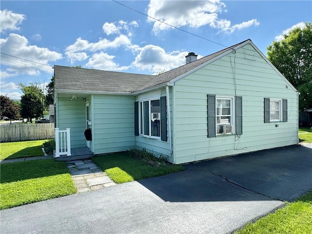 341 Grant St, Elmira-City, NY 14901 - view of front facade with a chimney and cooling unit