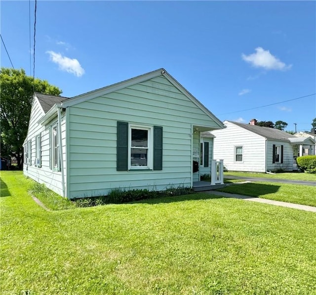 341 Grant St, Elmira-City, NY 14901 - view of front facade with a front lawn