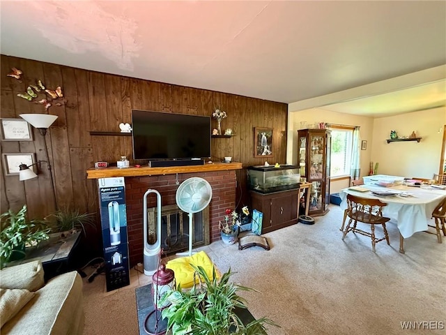 4545 Lower River Rd, Lewiston, NY 14092 - carpeted living area with wooden walls and a fireplace