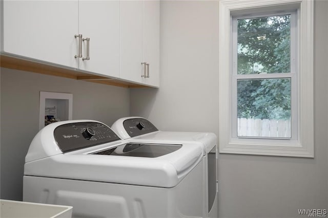 520 Paradise Rd, Amherst, NY 14051 - washroom featuring washer and clothes dryer and cabinet space