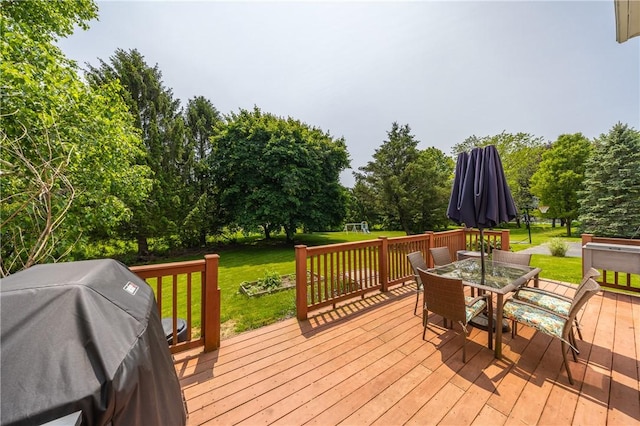 6 Barben Cir, Mendon, NY 14506 - wooden terrace featuring a lawn, outdoor dining area, grilling area, and view of wooded area