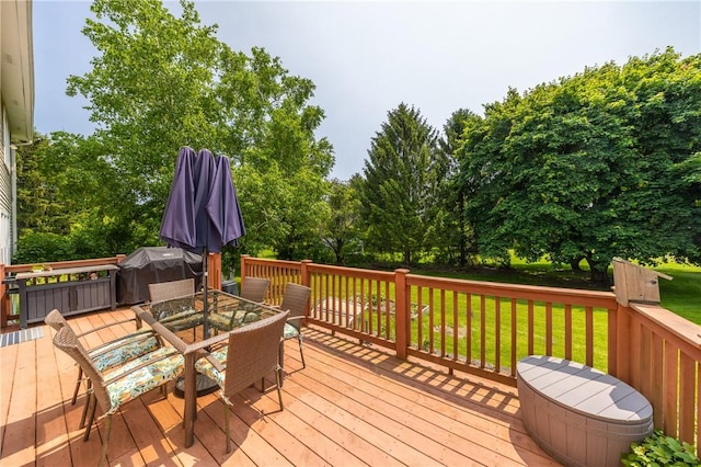 6 Barben Cir, Mendon, NY 14506 - wooden deck with outdoor dining area, a lawn, area for grilling, and view of wooded area
