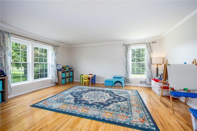 6 Barben Cir, Mendon, NY 14506 - recreation room featuring ornamental molding, wood finished floors, and baseboards