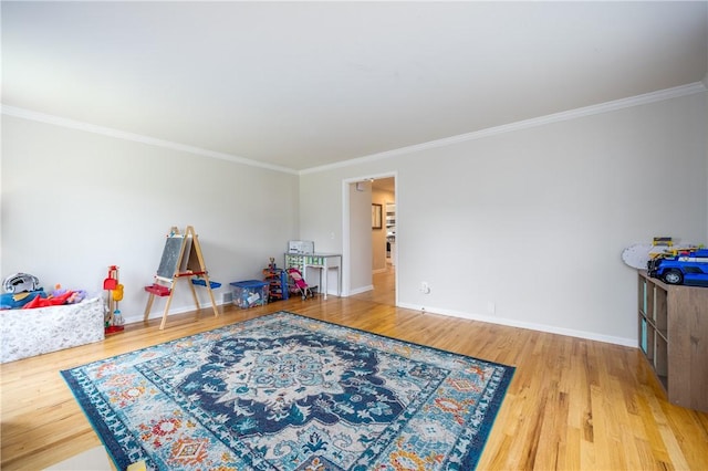 6 Barben Cir, Mendon, NY 14506 - game room featuring wood finished floors, crown molding, and baseboards