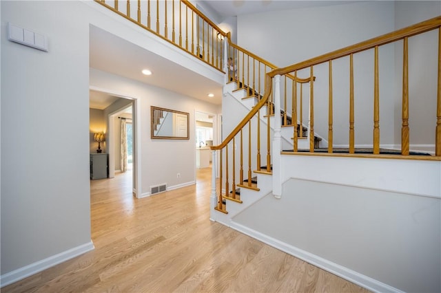 6 Barben Cir, Mendon, NY 14506 - staircase featuring wood finished floors, baseboards, and recessed lighting