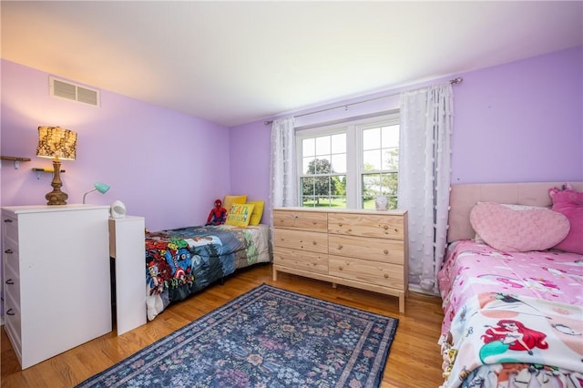 6 Barben Cir, Mendon, NY 14506 - bedroom with wood finished floors