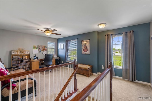 1 Skylark Ln, Wheatfield, NY 14304 - bedroom featuring light colored carpet, multiple windows, a desk, and baseboards