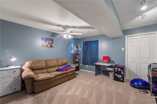 1 Skylark Ln, Wheatfield, NY 14304 - living room featuring carpet floors, a ceiling fan, and baseboards