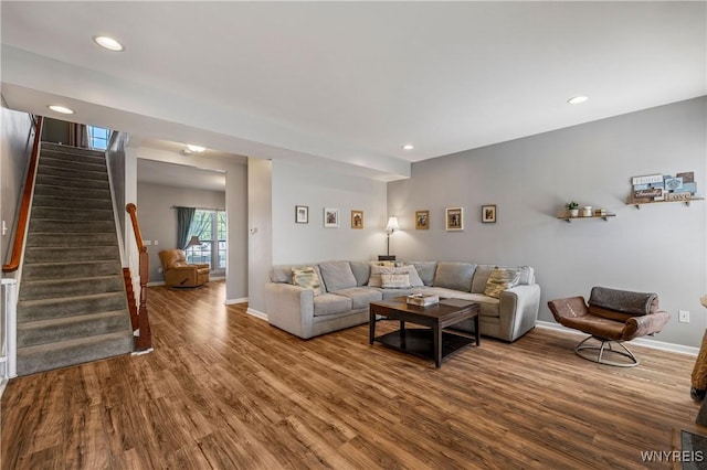 1 Skylark Ln, Wheatfield, NY 14304 - living room with wood finished floors, baseboards, stairway, and recessed lighting
