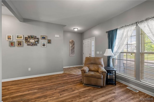 1 Skylark Ln, Wheatfield, NY 14304 - sitting room with wood finished floors and baseboards