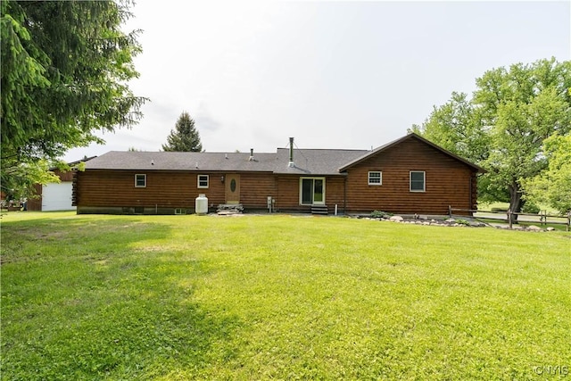 9758 E Rd, Denmark, NY 13367 - back of property with log siding