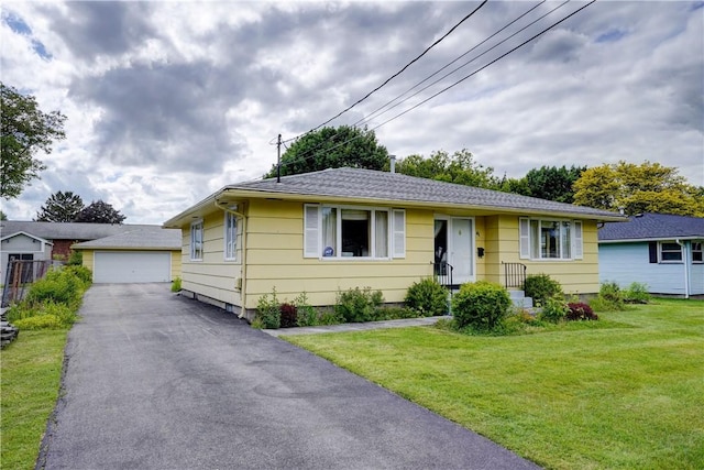 41 Leicestershire Rd, Irondequoit, NY 14621 - view of front facade featuring a detached garage, a front lawn, and an outbuilding