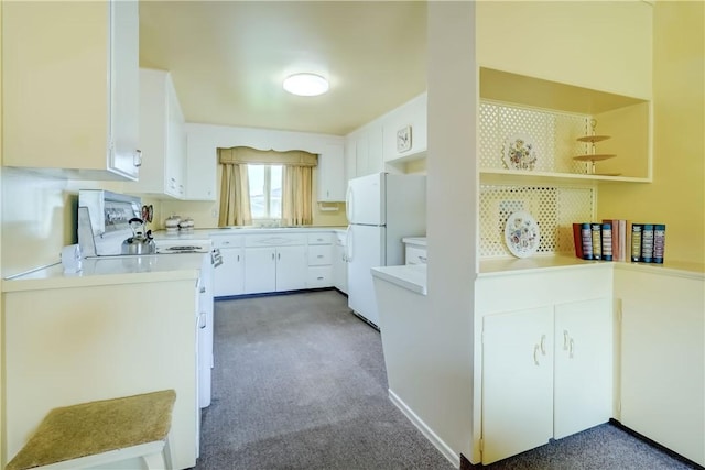 41 Leicestershire Rd, Irondequoit, NY 14621 - kitchen featuring range, freestanding refrigerator, carpet flooring, open shelves, and white cabinetry