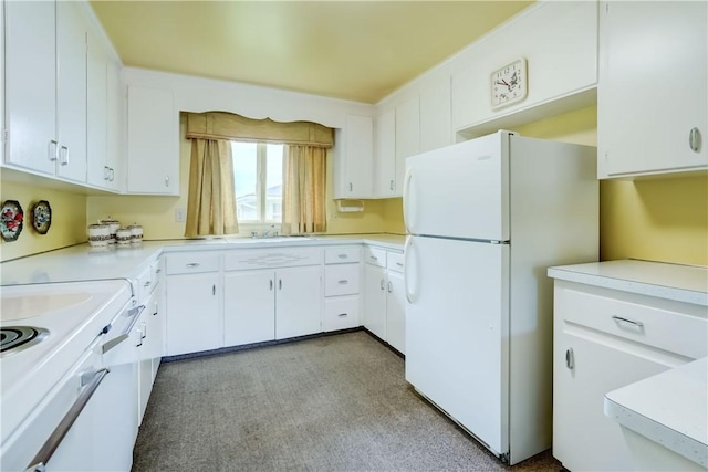41 Leicestershire Rd, Irondequoit, NY 14621 - kitchen with freestanding refrigerator, a sink, light countertops, and white cabinets