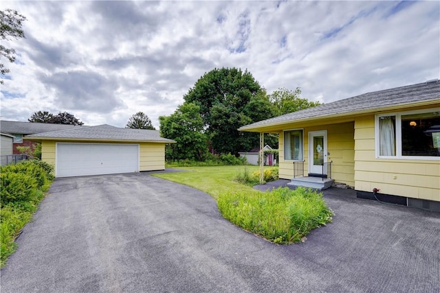 41 Leicestershire Rd, Irondequoit, NY 14621 - view of green lawn with a detached garage