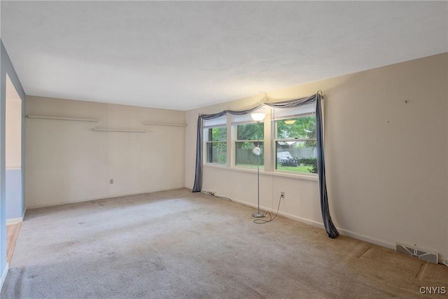 3643 Armstrong Rd, Camillus, NY 13209 - empty room featuring light carpet and baseboards