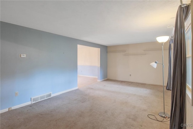 3643 Armstrong Rd, Camillus, NY 13209 - spare room featuring light colored carpet and baseboards