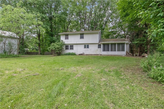 3643 Armstrong Rd, Camillus, NY 13209 - back of property with a sunroom and a yard