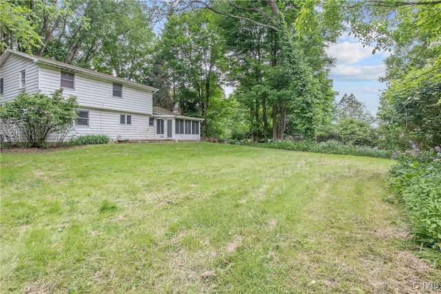 3643 Armstrong Rd, Camillus, NY 13209 - view of grassy yard featuring a sunroom