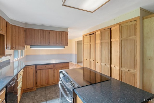 3643 Armstrong Rd, Camillus, NY 13209 - kitchen with stainless steel electric stove, black dishwasher, and dark countertops
