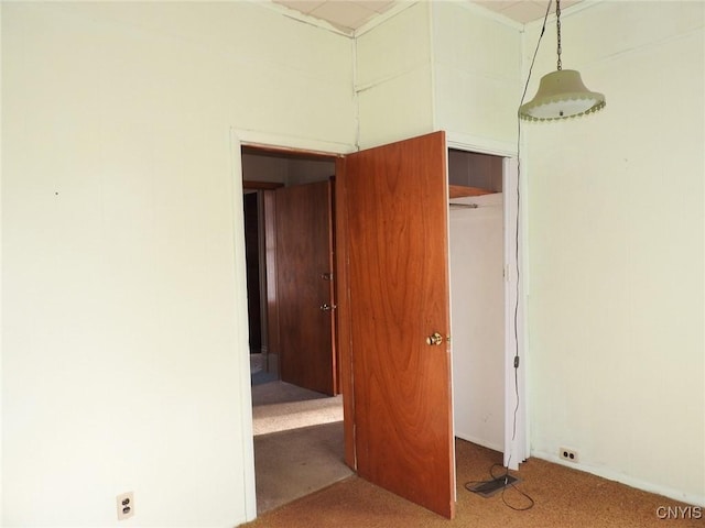 1658 Valley Dr, Syracuse, NY 13207 - unfurnished bedroom featuring a closet and carpet flooring