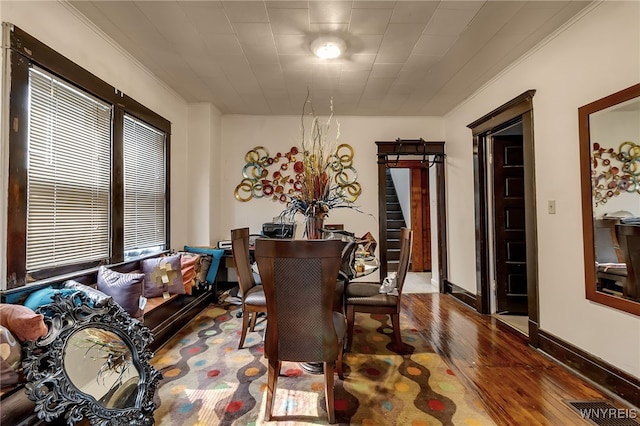1244 Kenmore Ave, Buffalo, NY 14216 - dining area with hardwood / wood-style floors, crown molding, stairway, and baseboards