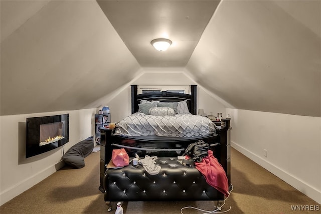 1244 Kenmore Ave, Buffalo, NY 14216 - bedroom with carpet floors, vaulted ceiling, and baseboards